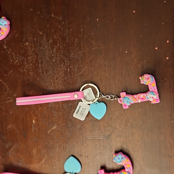 CLAIRS HOT PINK UNICORN LETTER KEY CHAINS - Picture 2 of 7